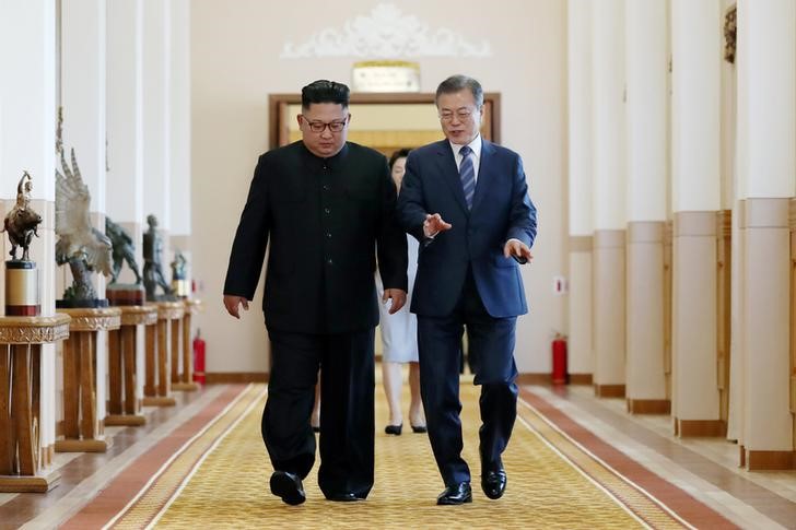 © Reuters. 北朝鮮の金委員長、韓国大統領の母死去で弔意