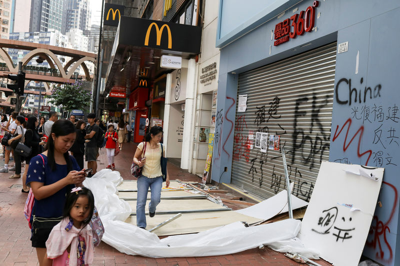 Hong Kong falls into first recession in 10 years as protests, trade war weigh