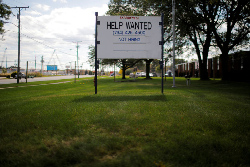 © Reuters. FILE PHOTO: A Help Wanted sign reads "Not Hiring" in Livonia