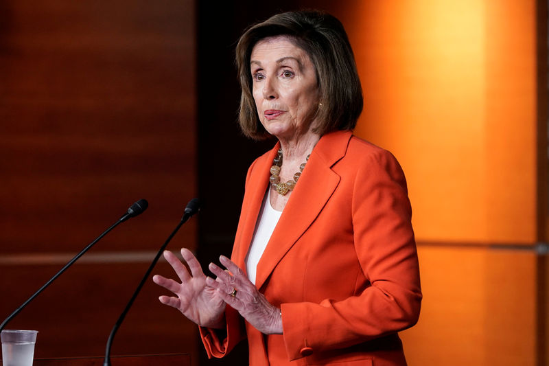 © Reuters. FILE PHOTO: Speaker of the House Nancy Pelosi (D-CA) speaks ahead of a House vote authorizing an impeachment inquiry into U.S. President Trump in Washington