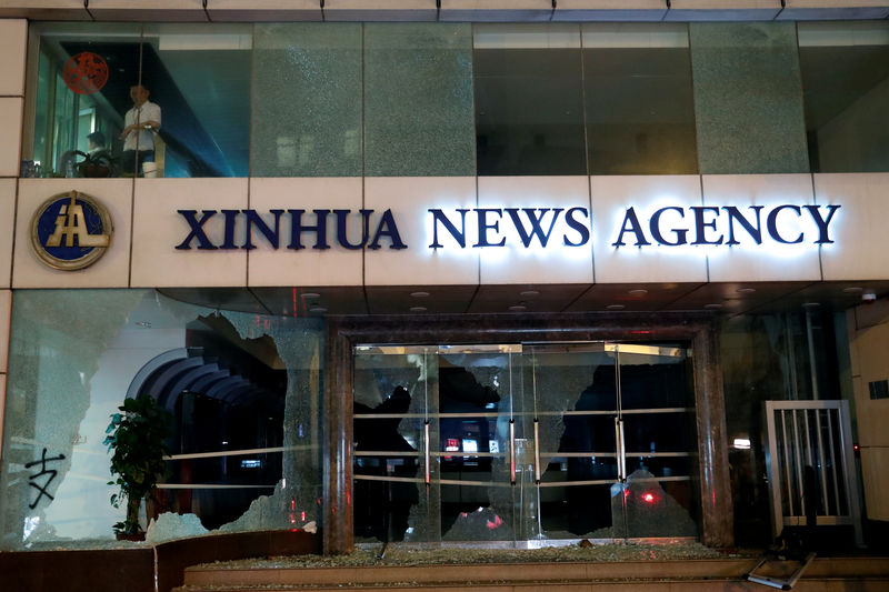 © Reuters. 香港デモで新華社が標的に、中国国営メディア「厳しい対応を」
