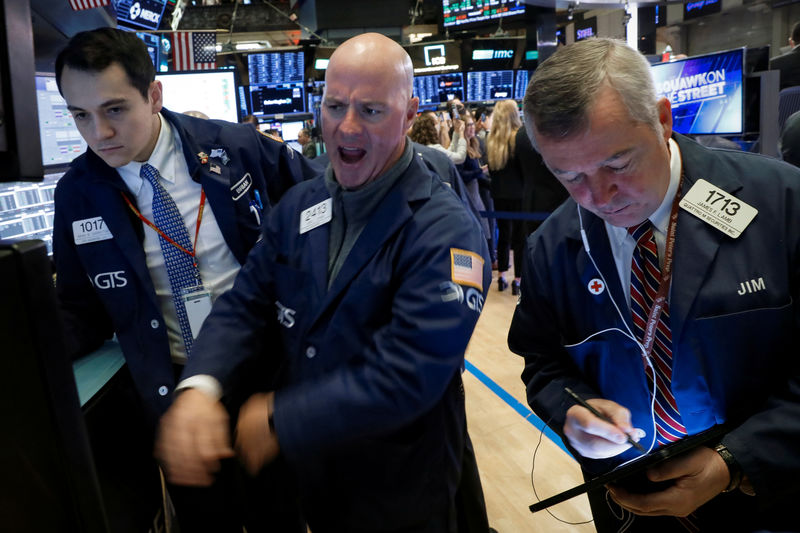 Wall Street hits record high on energy, tech boost