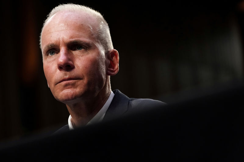 © Reuters. FILE PHOTO: Dennis Muilenburg testifies before the U.S. Senate Commerce, Science and Transportation Committee