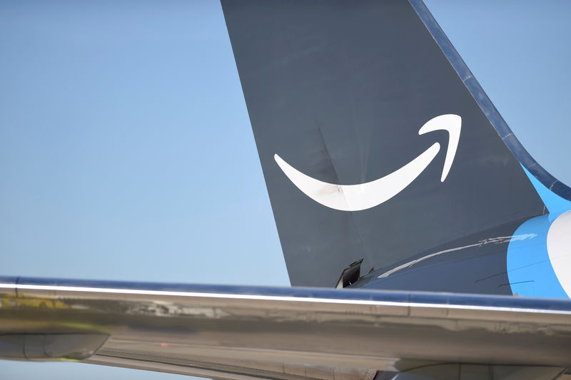 © Reuters. FILE PHOTO: A wide body aircraft emblazoned with Amazon's Prime logo is unloaded at Lehigh Valley International Airport in Allentown, Pennsylvania, U.S.
