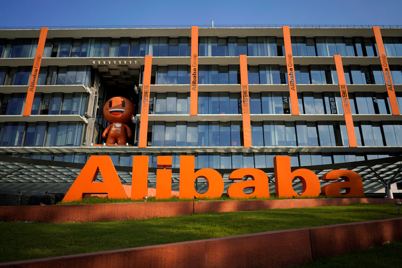 © Reuters. FILE PHOTO: The logo of Alibaba Group is seen at the company's headquarters in Hangzhou