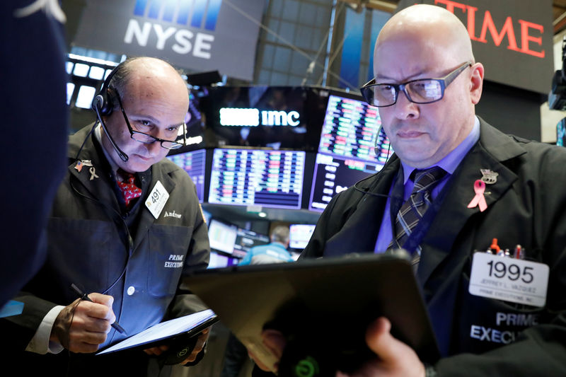 Indexes trade near flat, pause as trade deal doubts resurface