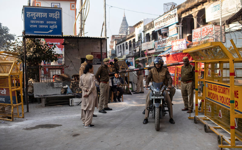 India detains dozens over social media posts, celebrations after religious site ruling