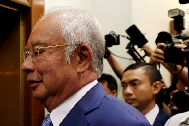 © Reuters. FILE PHOTO: Former Malaysian Prime Minister Najib Razak arrives at Kuala Lumpur High Court in Kuala Lumpur