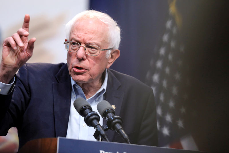 © Reuters. FILE PHOTO: Democratic 2020 U.S. presidential candidate Senator Bernie Sanders speaks during a Climate Crisis Summit with Rep. Alexandria Ocasio-Cortez at Drake University in Des Moines