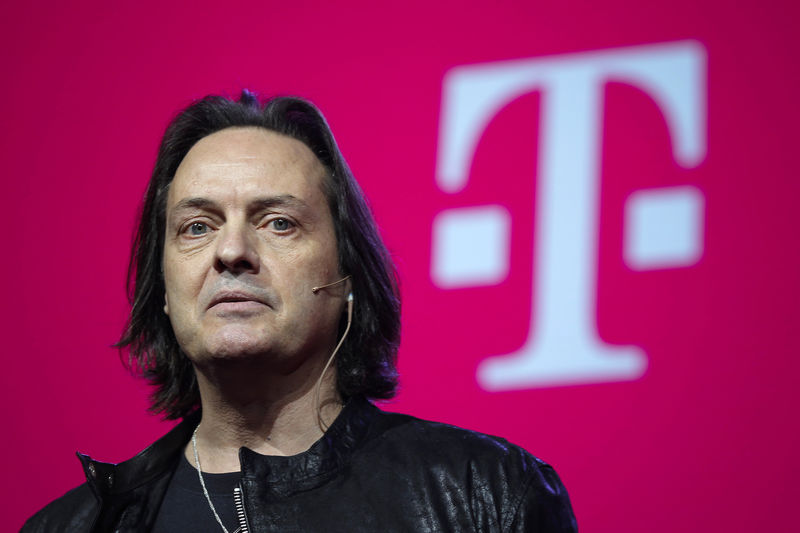 © Reuters. T-Mobile CEO Legere speaks to guests during their company's Un-carrier 9.0 event in New York