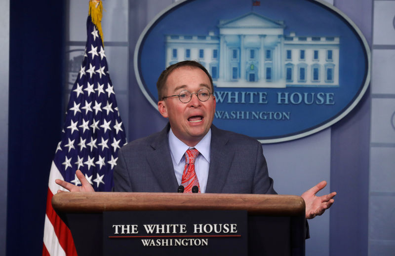 © Reuters. FILE PHOTO: Acting White House Chief of Staff Mulvaney answers questions at media briefing at the White House in Washington