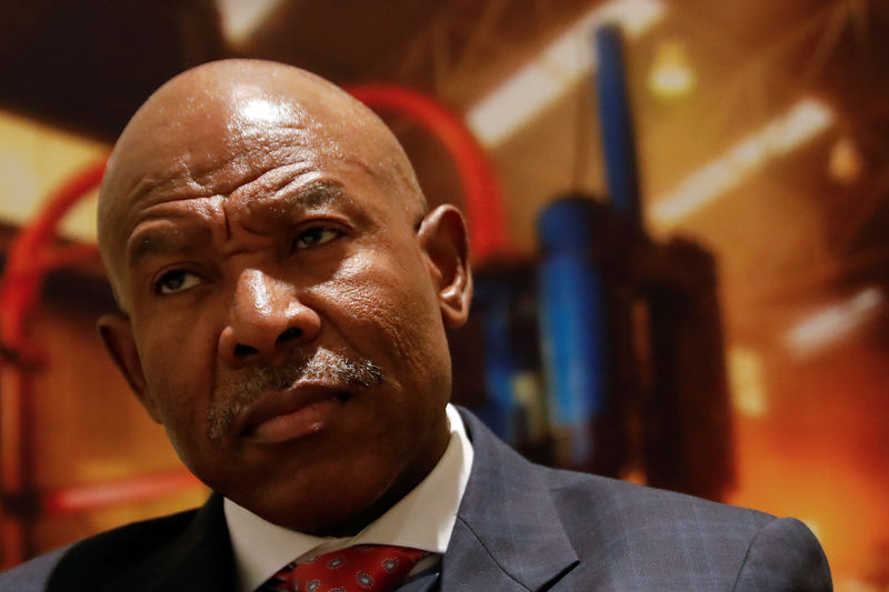 © Reuters. FILE PHOTO: South African Reserve Bank governor Lesetja Kganyago listens during an interview in New York City