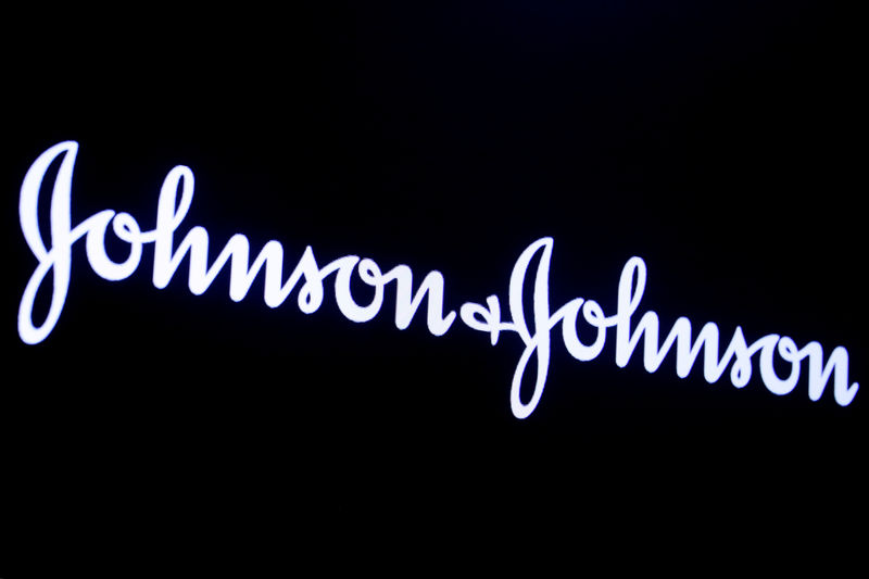 © Reuters. FILE PHOTO: The company logo for Johnson & Johnson is displayed on a screen to celebrate the 75th anniversary of the company's listing at the NYSE in New York
