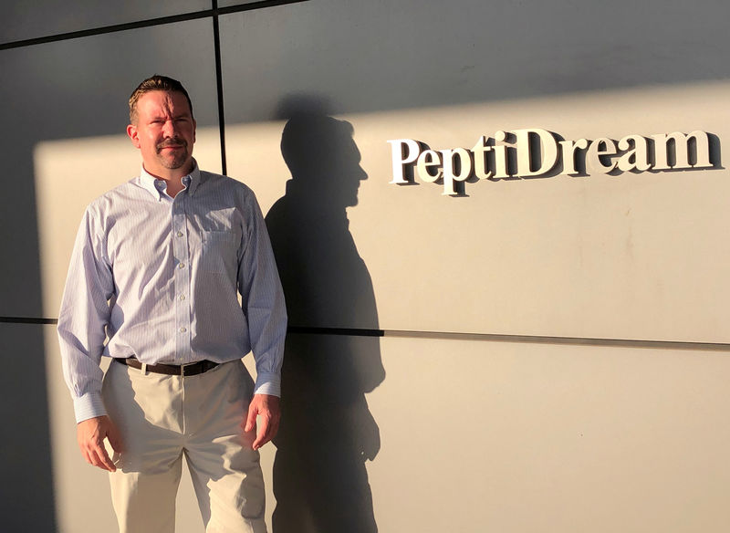 © Reuters. Patrick Reid, President and CEO of PeptiDream Inc, poses for a photograph at the company headquarters in Kawasaki, Japan