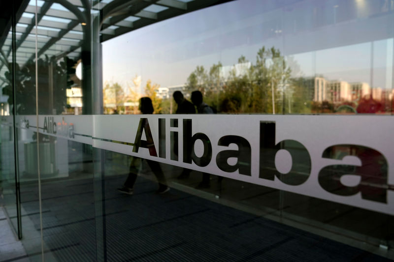 Alibaba to pioneer paperless listing in break with Hong Kong norm