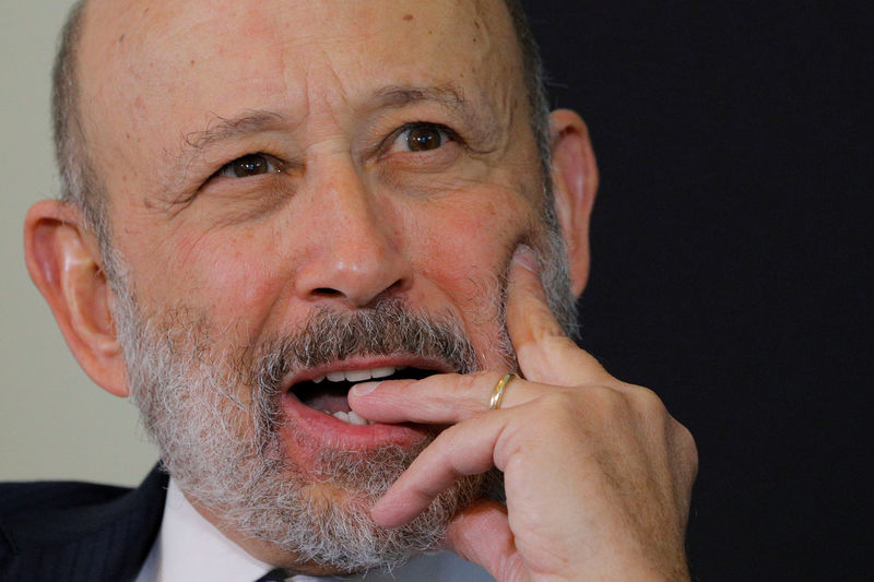 © Reuters. Blankfein, CEO of Goldman Sachs, reacts at Boston College Chief Executives Club luncheon in Boston