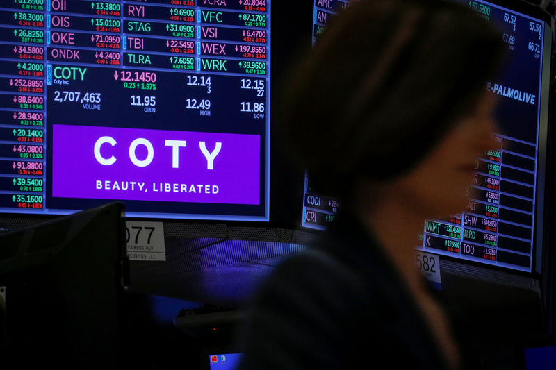 © Reuters. A screen displays the logo and trading information for Coty Inc at the NYSE in New York