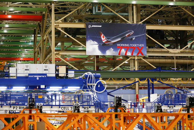 © Reuters. A large 777X banner is seen hanging over the Boeing 777X Final Assembly Building floor during a media tour of Boeing production facilities in Everett