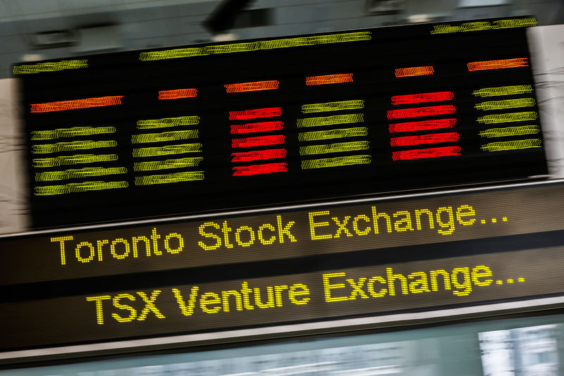 © Reuters. A sign board displaying Toronto Stock Exchange stock information is seen in Toronto