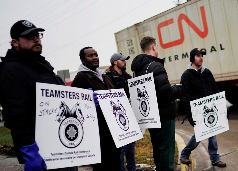 Thousands of CN Rail workers hold first strike in a decade