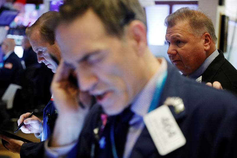 Wall Street dips as investors await U.S.-China trade progress