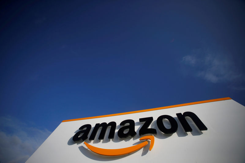 © Reuters. FILE PHOTO: The logo of Amazon is seen at the company logistics centre in Boves