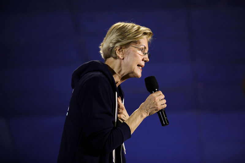 Democrat Warren accuses rival Bloomberg of trying to buy U.S. presidential election