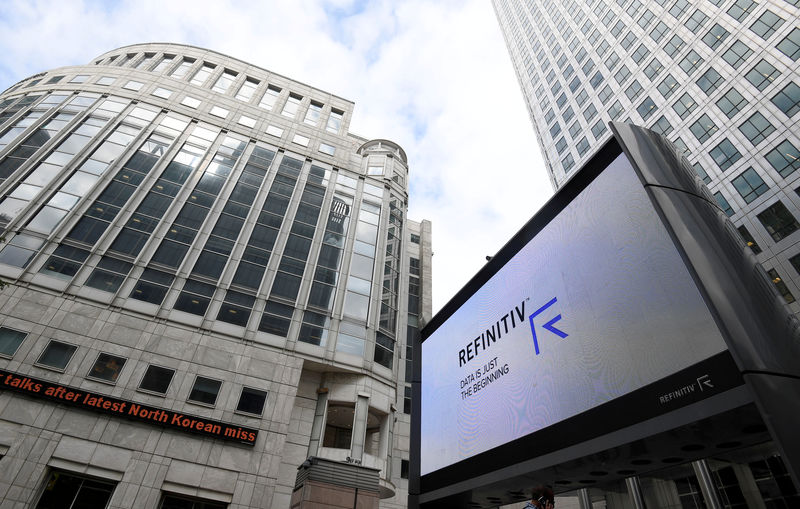 © Reuters. FILE PHOTO: The Refinitiv logo is seen on a large screen in Canary Wharf in London