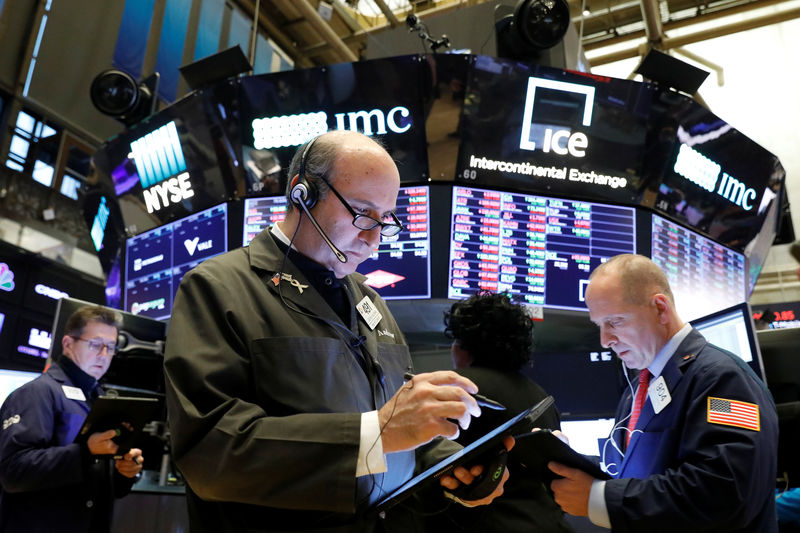 Wall Street crawls to record levels on trade hopes