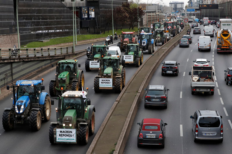 French farmers clog highways to protest at 'agri-bashing'