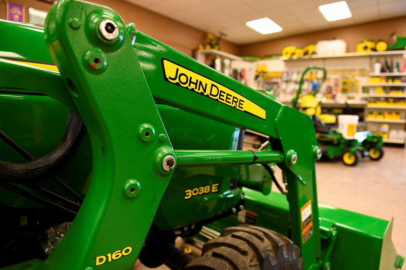 Deere's earnings fall on trade tensions, poor weather