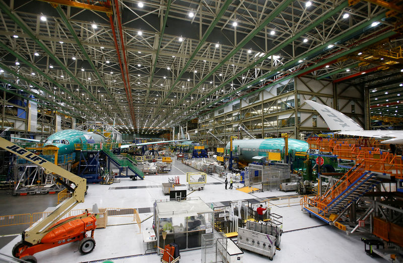© Reuters. Several Boeing 777X aircraft are seen in various stages of production during a media tour of the Boeing 777X at the Boeing production facility in Everett,