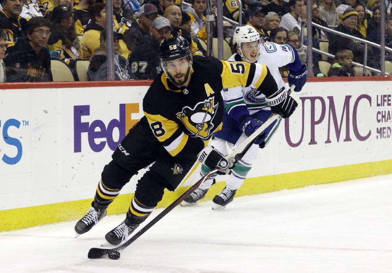 NHL roundup: Penguins rally for wild win