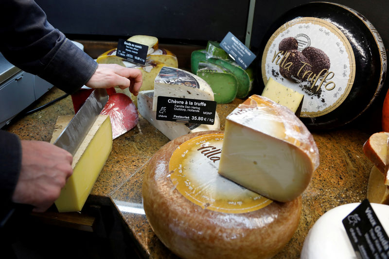 U.S. vows 100% tariffs on French Champagne, cheese, handbags over digital tax