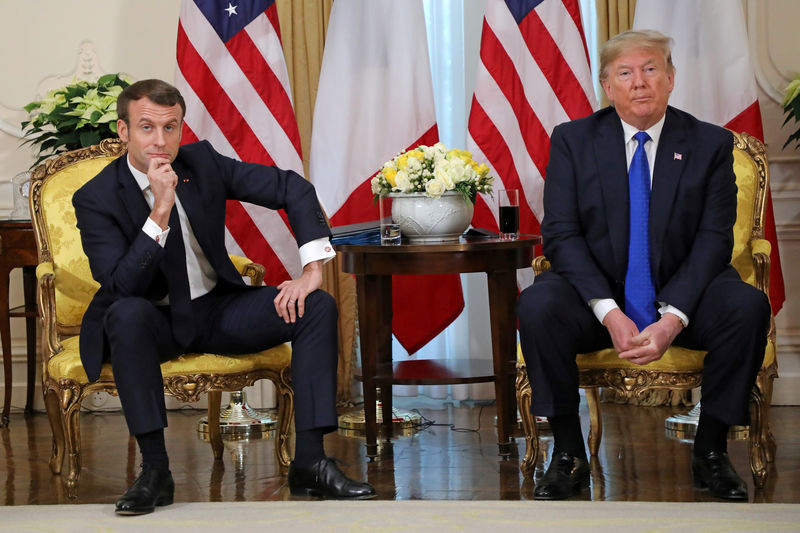 © Reuters. U.S. President Trump meets France's President Macron, ahead of the NATO summit, in London