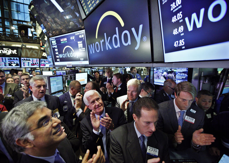 © Reuters. Workday Inc. Co-Founders Bhusri and Duffield applaud thier company's first trade following the IPO on the floor of the New York Stock Exchange