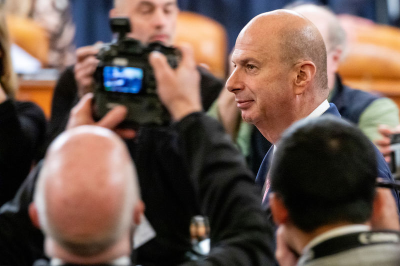 © Reuters. FILE PHOTO: U.S. Ambassador to the EU Sondland returns after a break in his testimony before a House Intelligence Committee hearing as part of the Trump impeachment inquiry in Washington