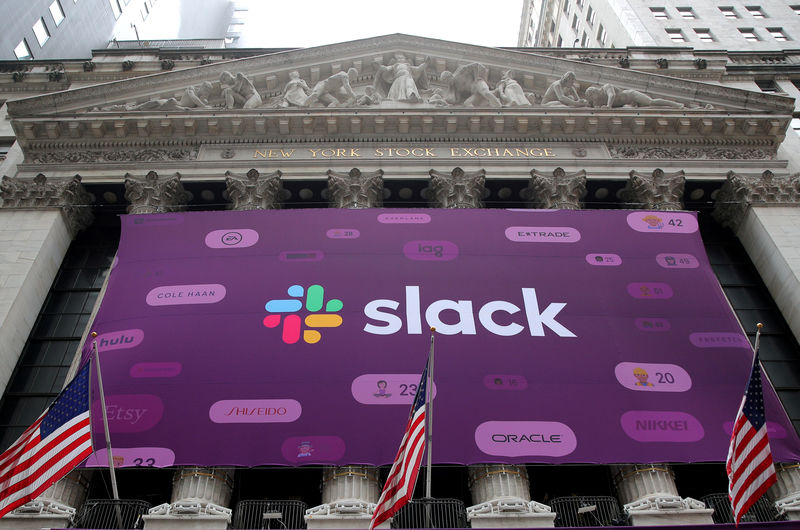 © Reuters. FILE PHOTO: The Slack Technologies Inc. logo is seen on a banner outside the New York Stock Exchange (NYSE) during the company's direct listing in New York