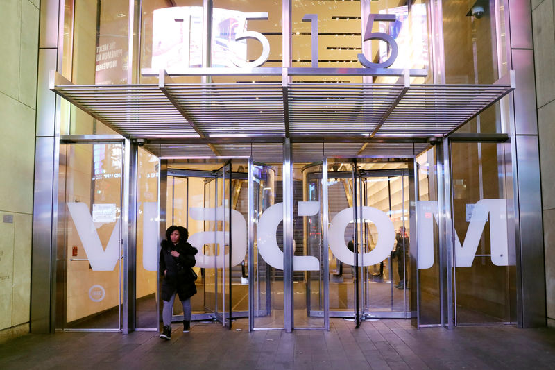 © Reuters. A woman walks out of the Viacom building in New York