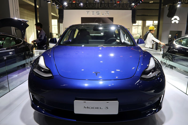 © Reuters. China-made Tesla Model 3 electric vehicle is seen ahead of the Guangzhou auto show in Guangzhou