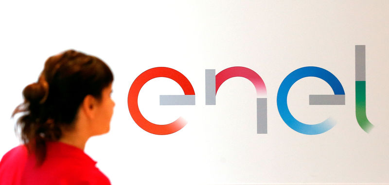 © Reuters. FILE PHOTO: The new logo of Italy's biggest utility Enel is seen inside its flagship store in downtown Milan
