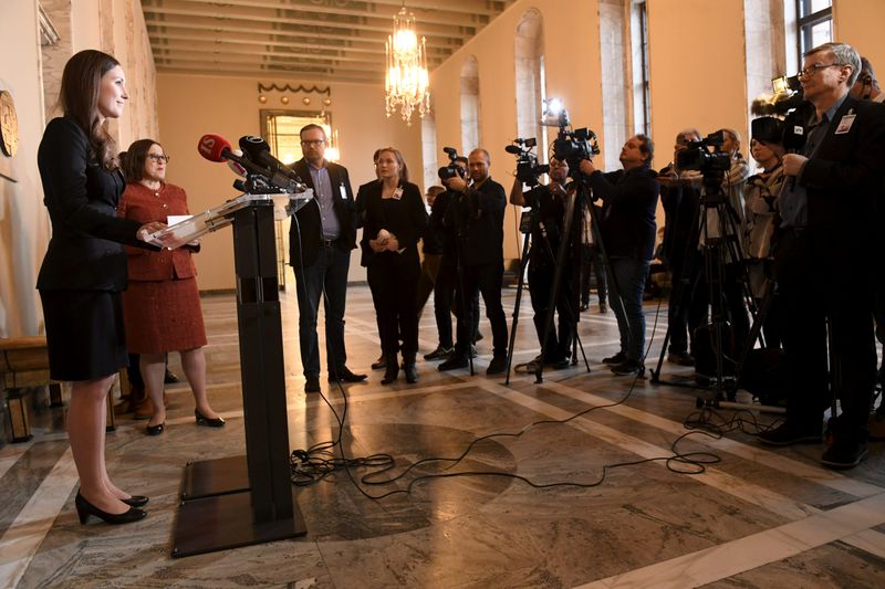 © Reuters. Social democrats minister Sanna Marin speaks to the media after she was elected as the new Prime Minister of Finland in the session of the Finnish Parliament in Helsinki