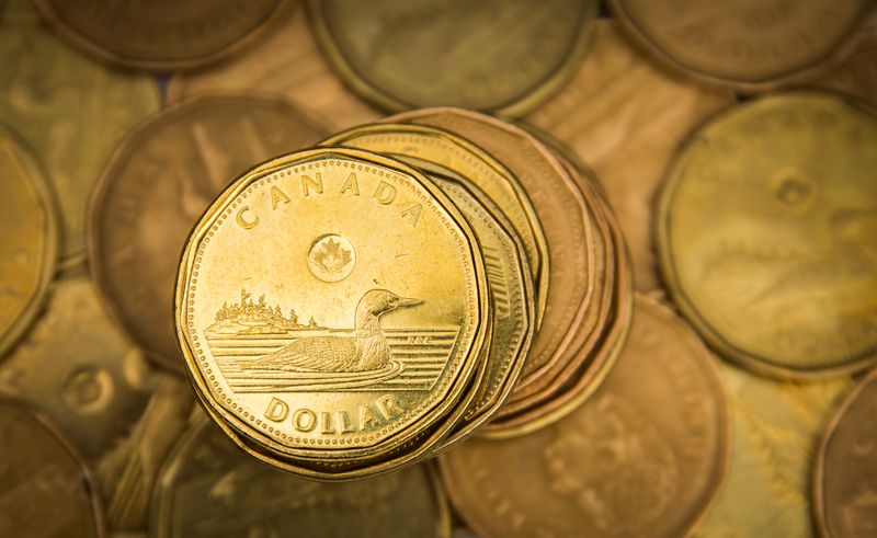 Canadian dollar firms as investors weigh potential U.S.-China tariffs delay