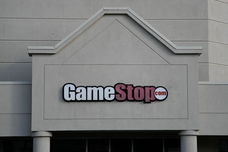 GameStop cuts full-year profit forecast, shares slump 21%