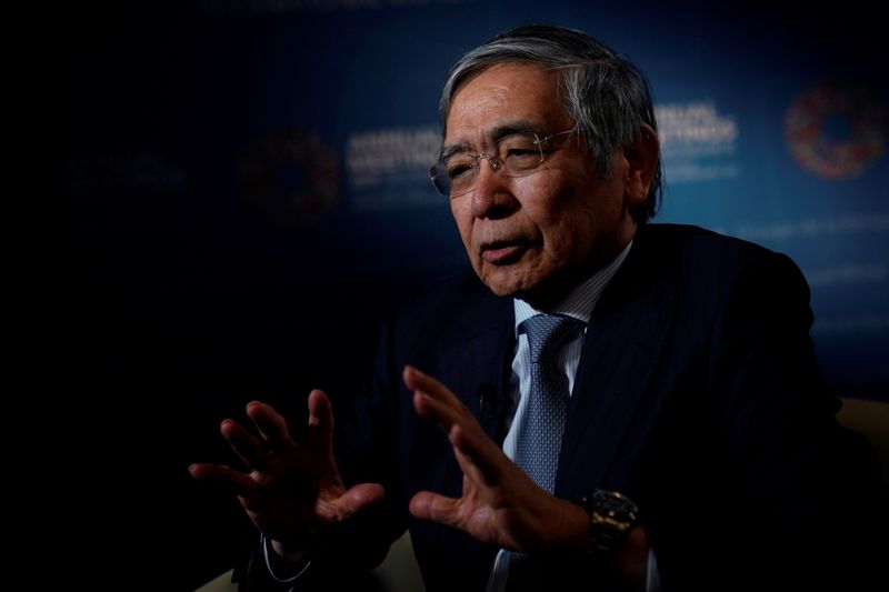 © Reuters. FILE PHOTO: Bank of Japan (BOJ) Governor Haruhiko Kuroda, speaks during an interview with Reuters in Washington
