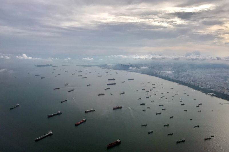 © Reuters. FILE PHOTO: A bird's-eye view of ships along the coast in Singapore