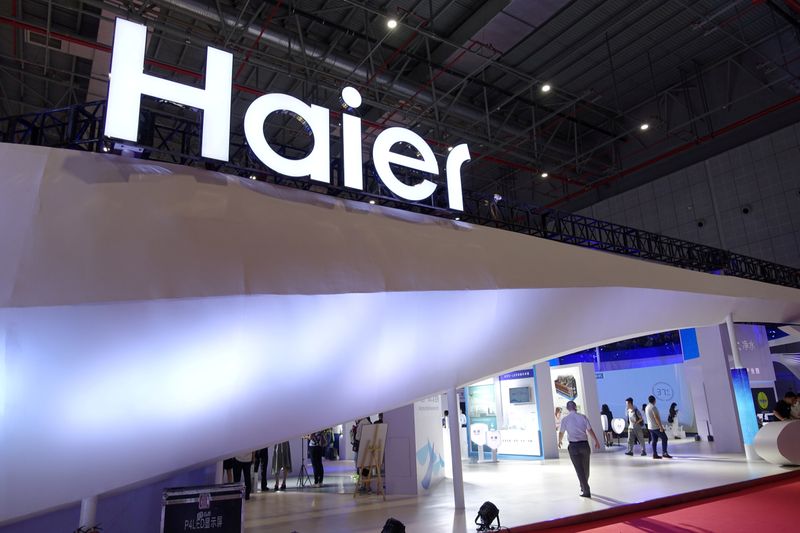 © Reuters. FILE PHOTO: Haier sign is seen at its booth during the Aquatech China exhibition in Shanghai