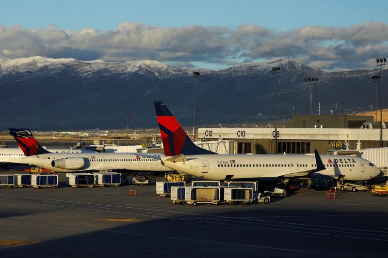 © Reuters. FILE PHOTO:  Delta Air Lines planes are shown parked at their gates at the airport in Salt Lake City