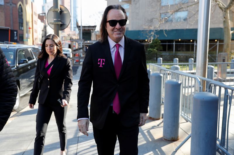 © Reuters. T-Mobile US Inc Chief Executive Officer John Legere arrives at Manhattan Federal Court during the T-Mobile/Sprint federal case in New York