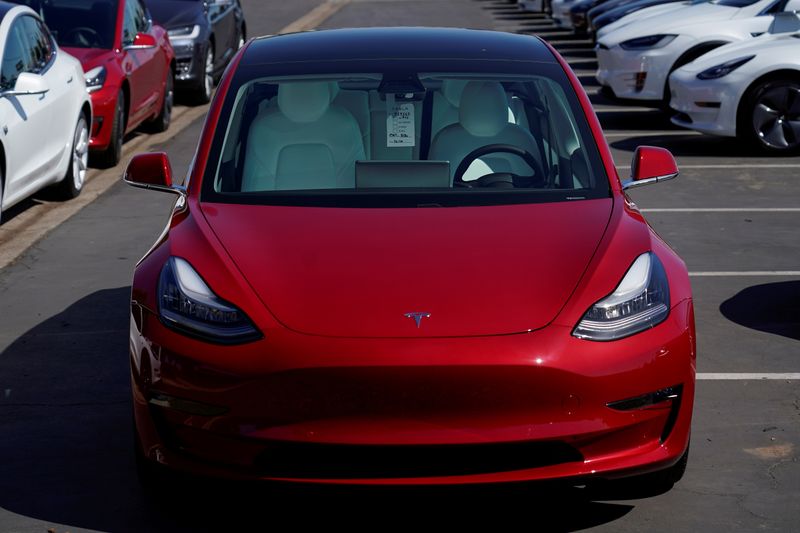 © Reuters. FILE PHOTO: A new Tesla Model 3 is shown at a delivery center on the last day of the company's third quarter, in San Diego